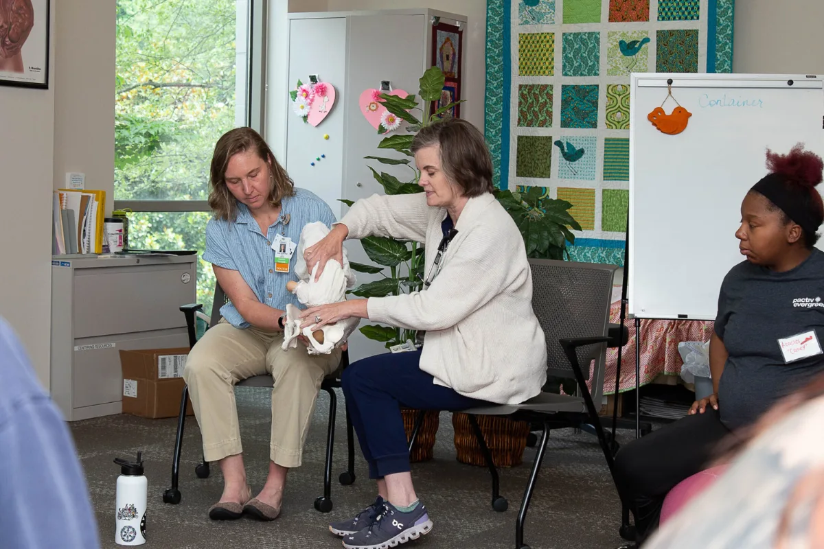 Healthcare provider speaking with patient