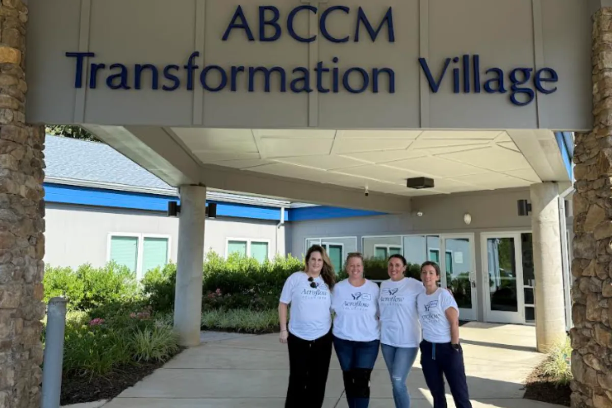 Group outside community building entrance
