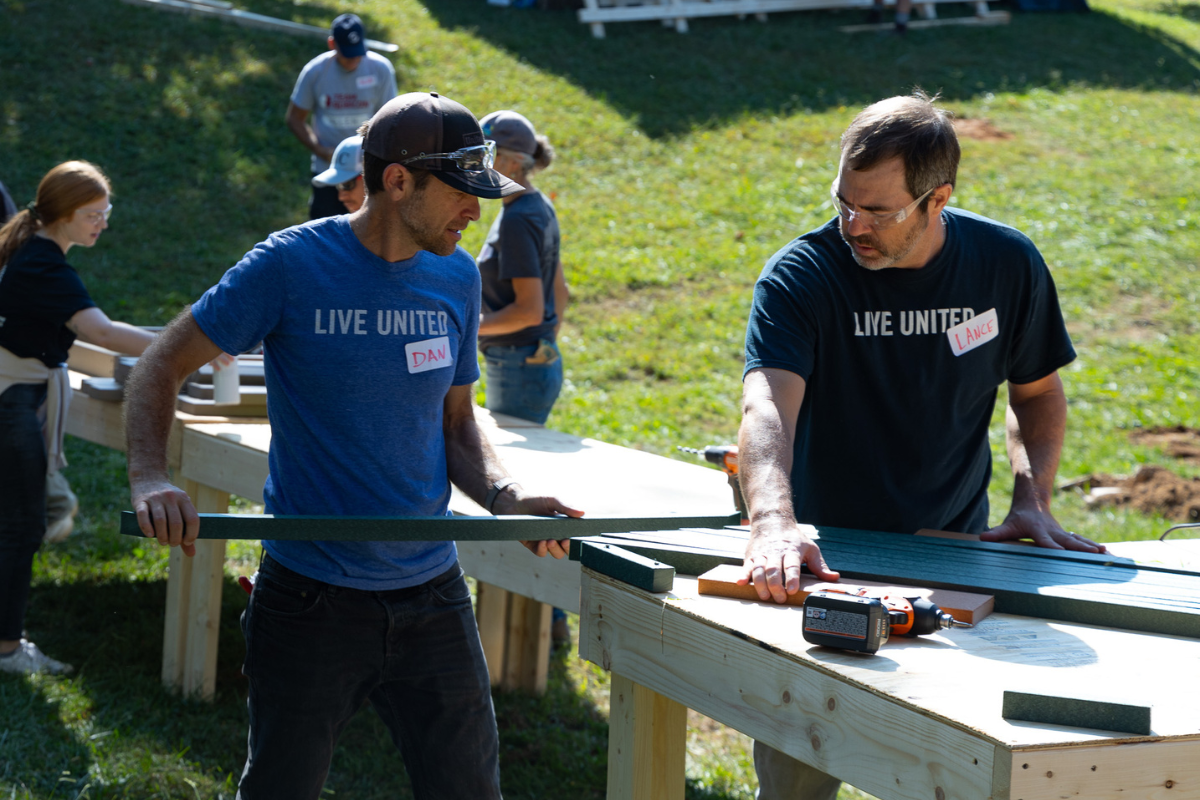 Volunteers working together outdoors