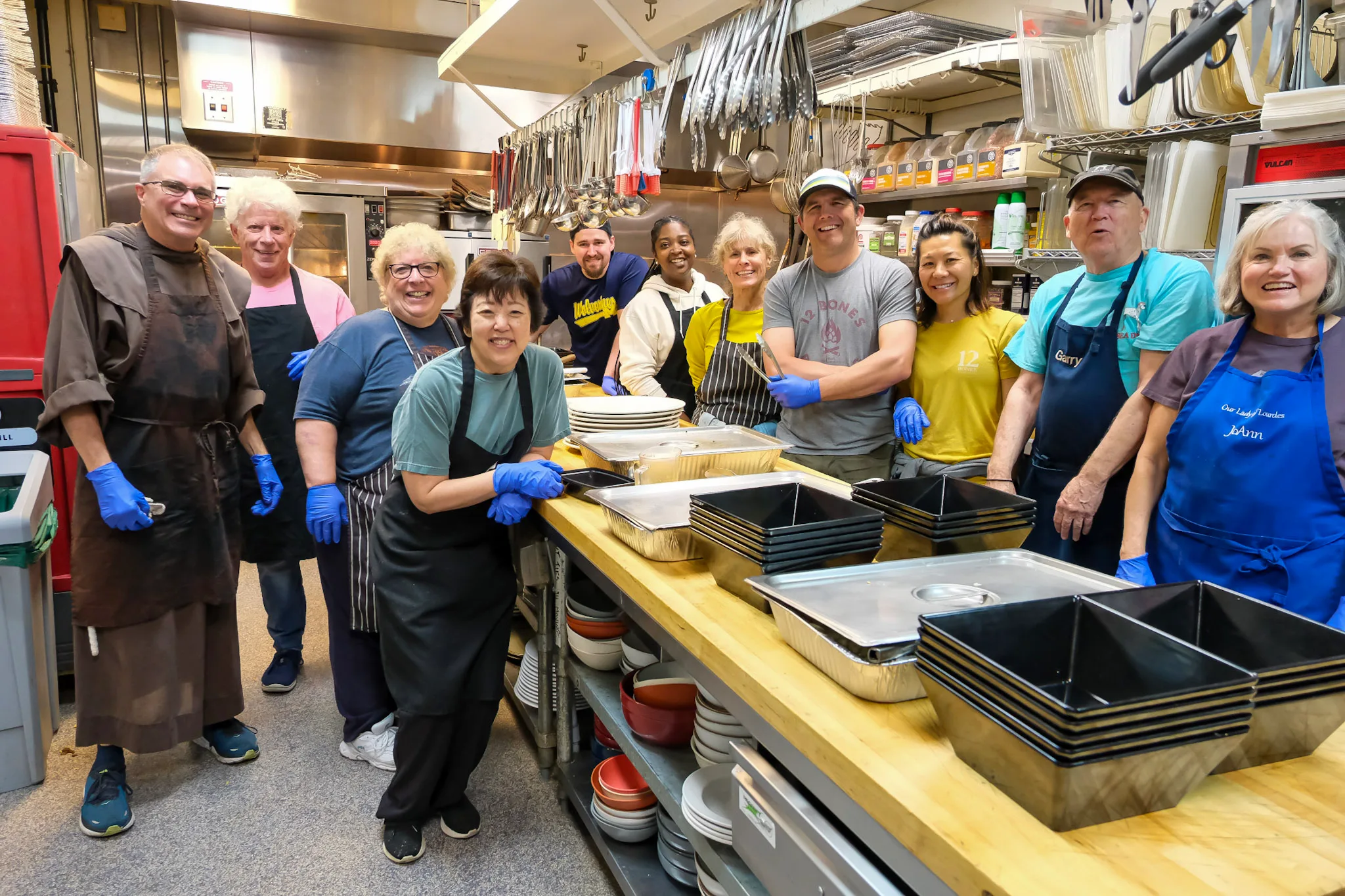 Volunteers working in warehouse setting