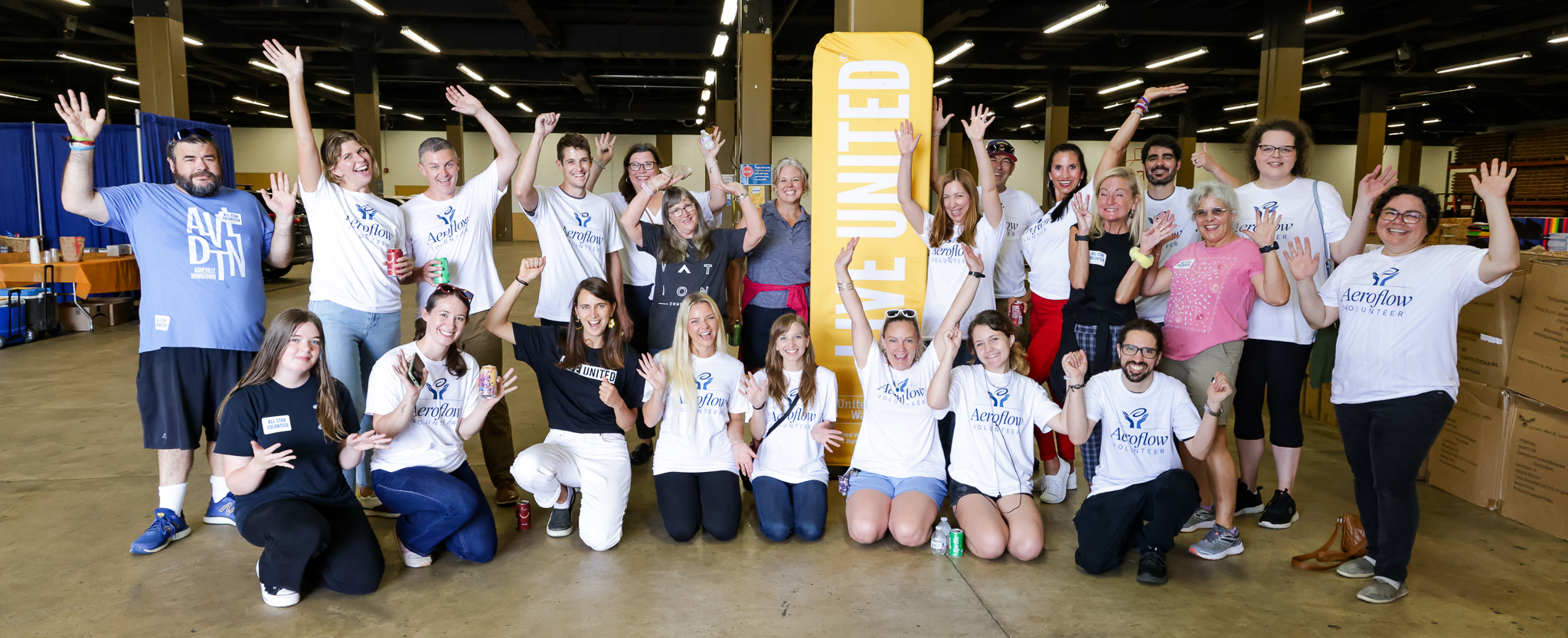 Group posing at organized event