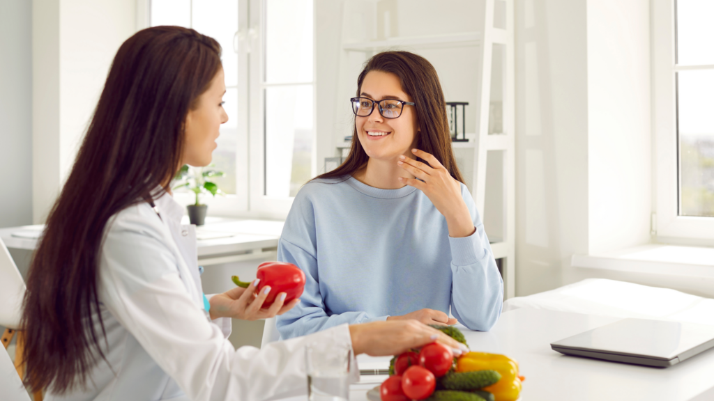 Nutritionist consulting with client